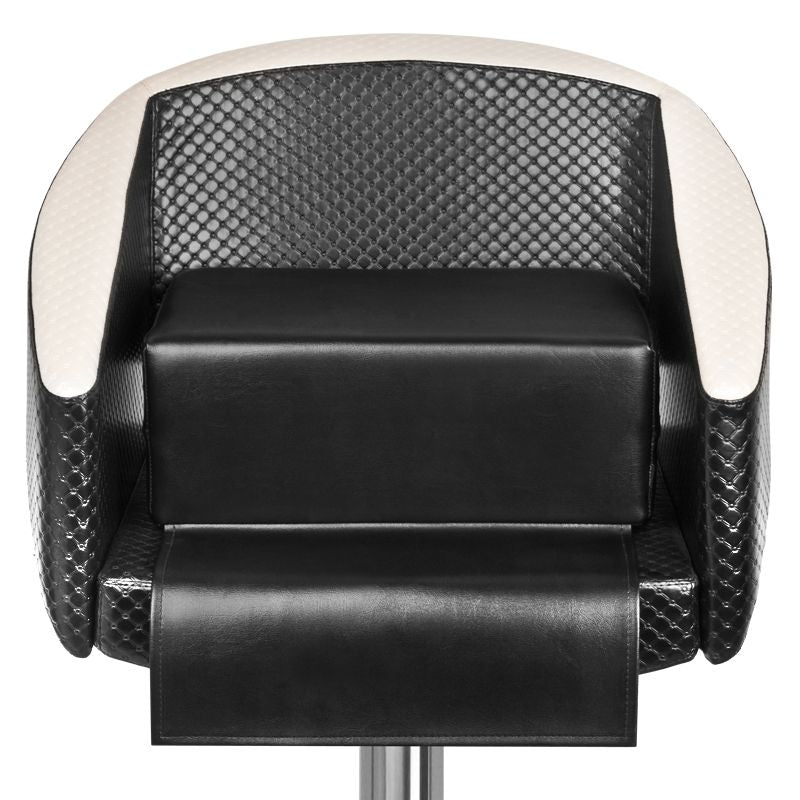 Black children's seat on the barber's chair